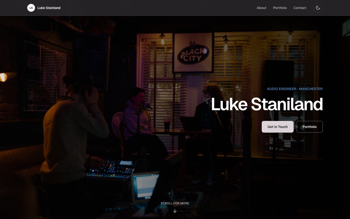 The Staniland Audio homepage, with Luke Staniland at a mixing desk during a live session